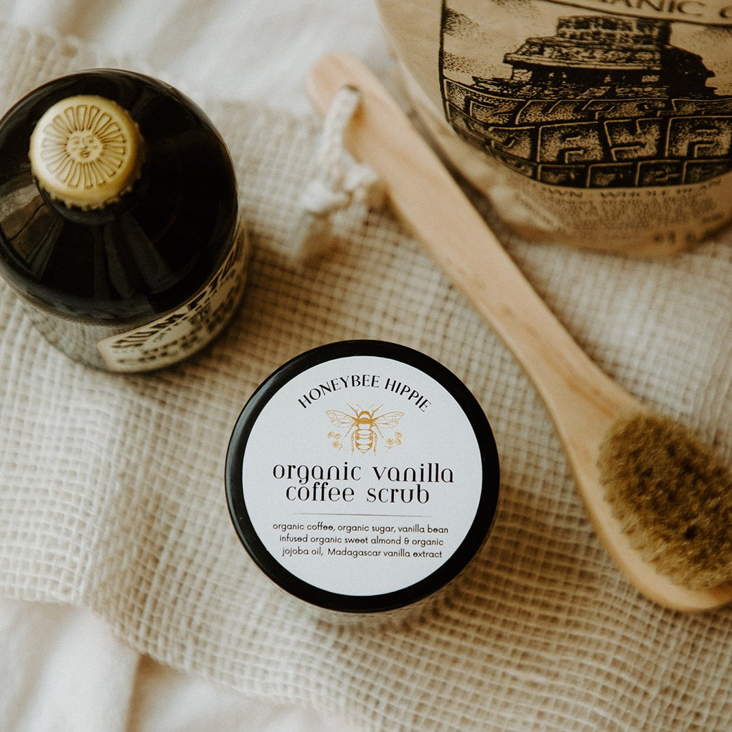 a top down view of a closed jar of honeybee hippie's organic all natural vanilla coffee scrub skin care