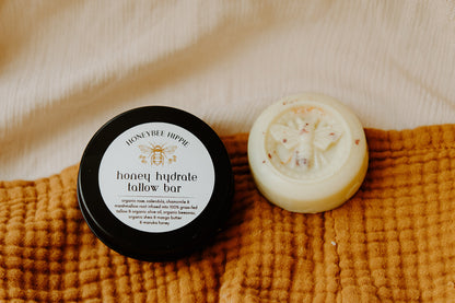 the tin and solid tallow bar for moisturizing skin made with natural ingredients for soothing skin by honeybee hippie